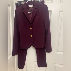 Calvin Klein plum suit.